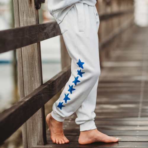 White sweatpants with stars sale